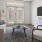 a living room with a tv and couches