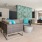 a living room with a couch and chairs