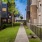 a sidewalk between buildings