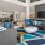 a living room with a tv and couches